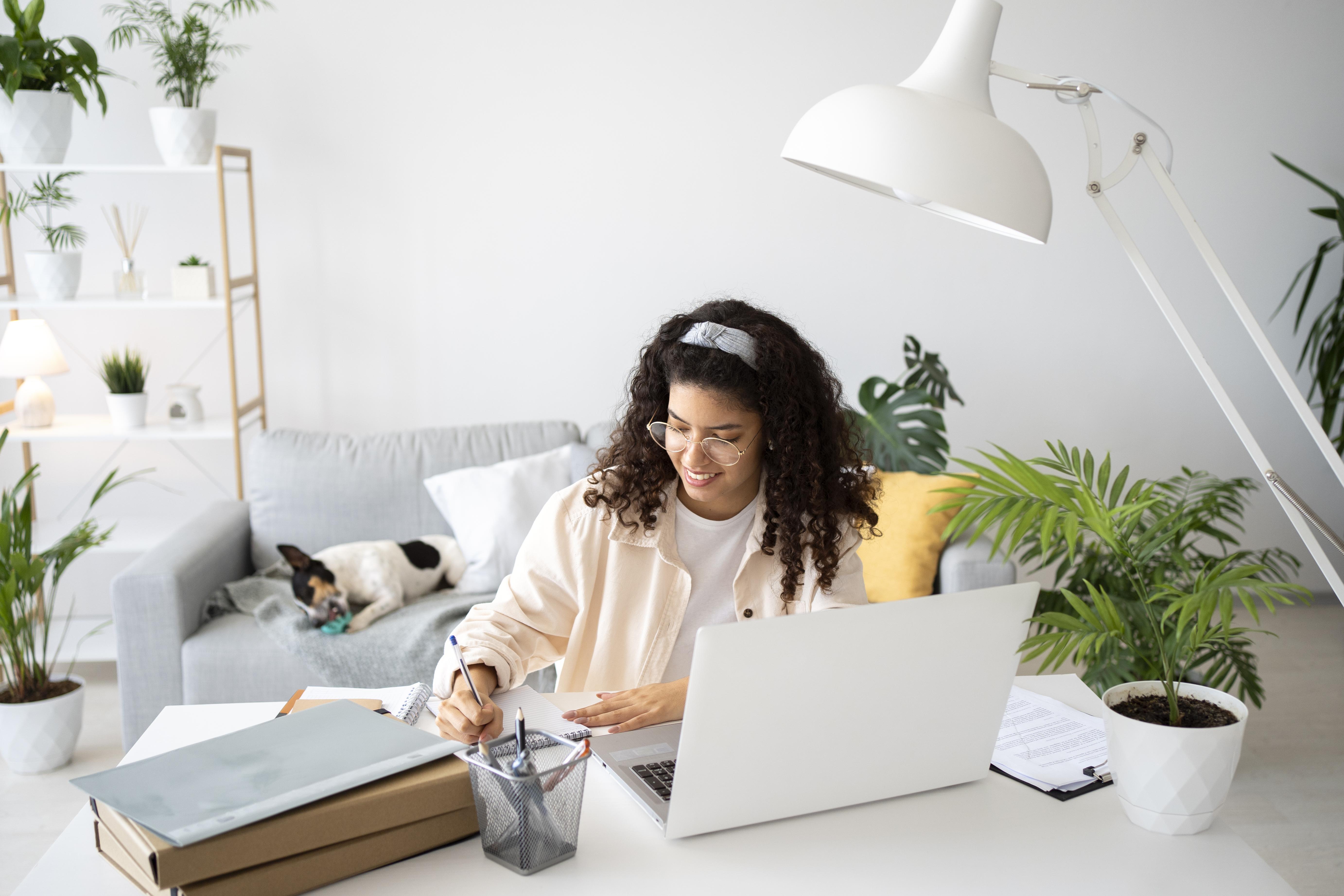 Laptop workspace in a bright home setting