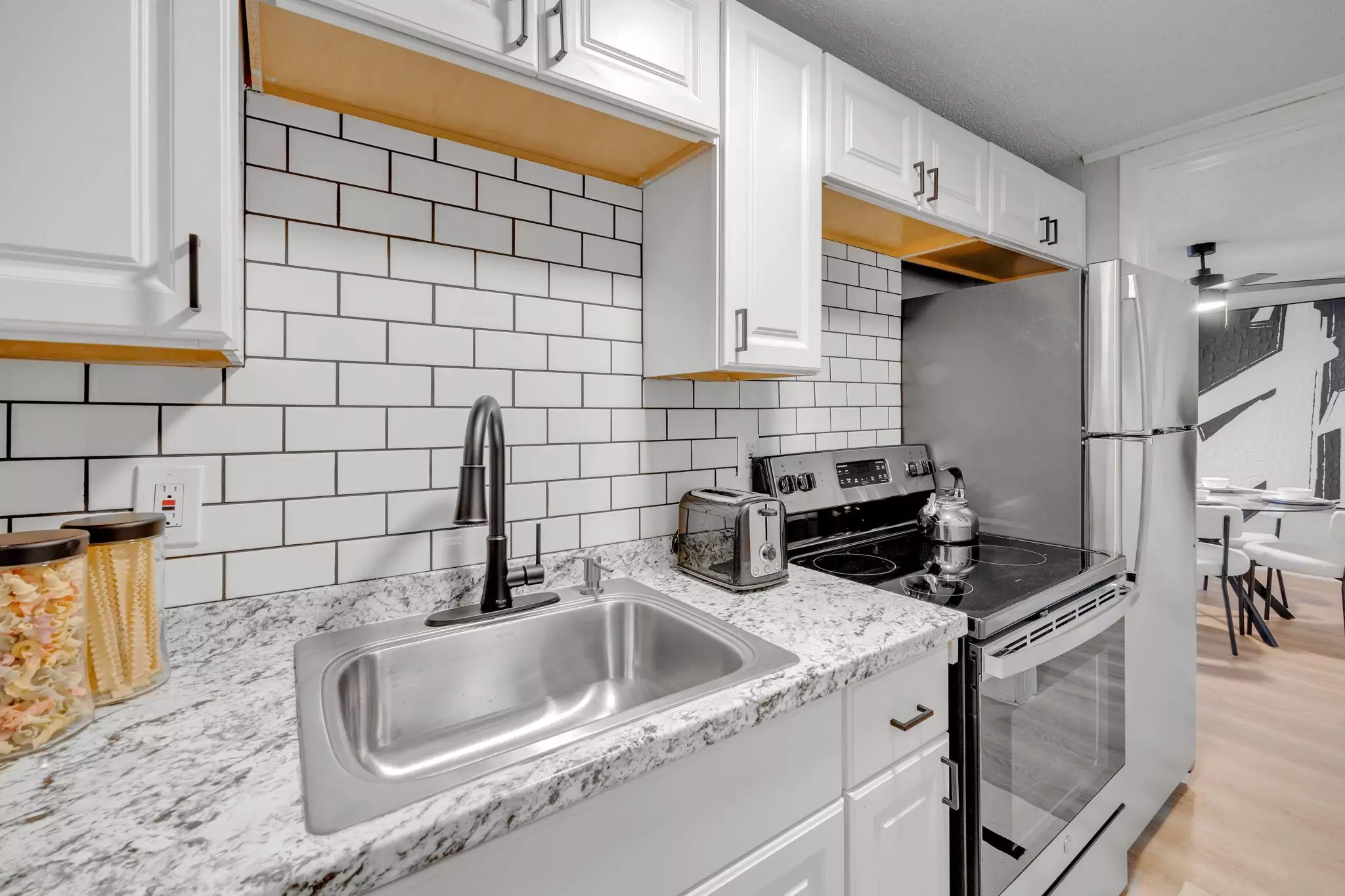 Kitchen and dining space in a JaxBay apartment